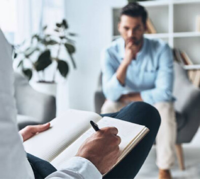 psychologist writing down notes